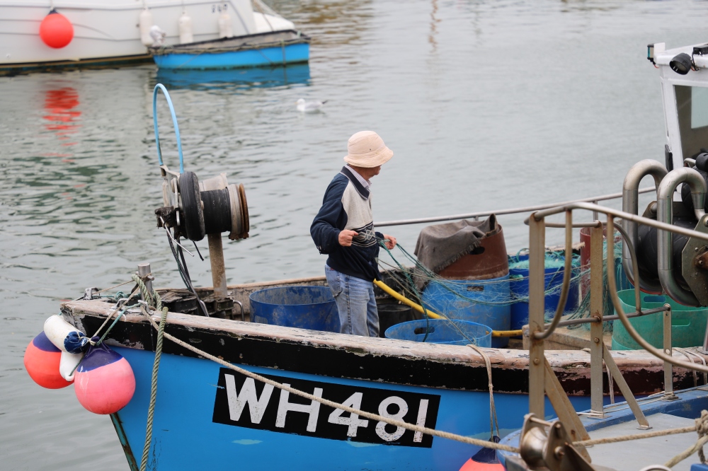 Fisherman, West Bay harbour, Dorset